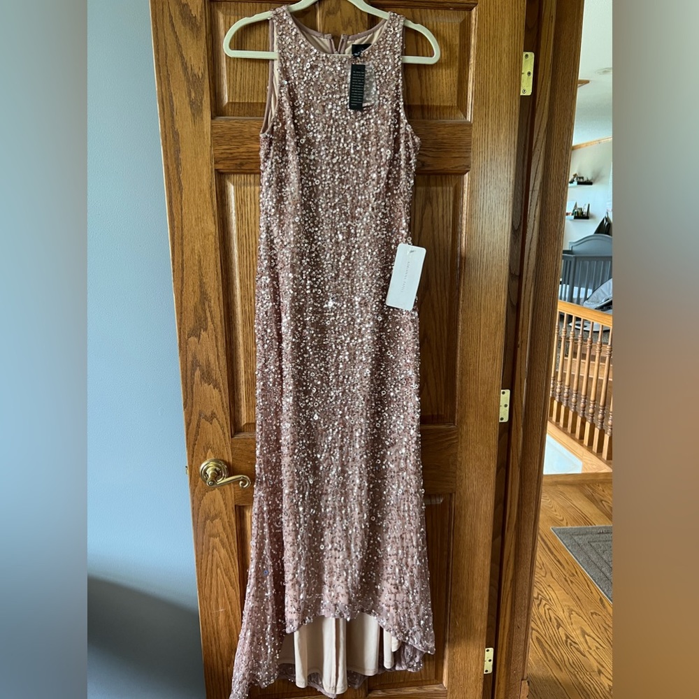 Brand new!! Long sequence rose gold dress
